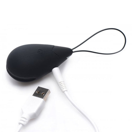 A black, vibrating silicone egg from xr brands, a pleasure toy for discreet stimulation.