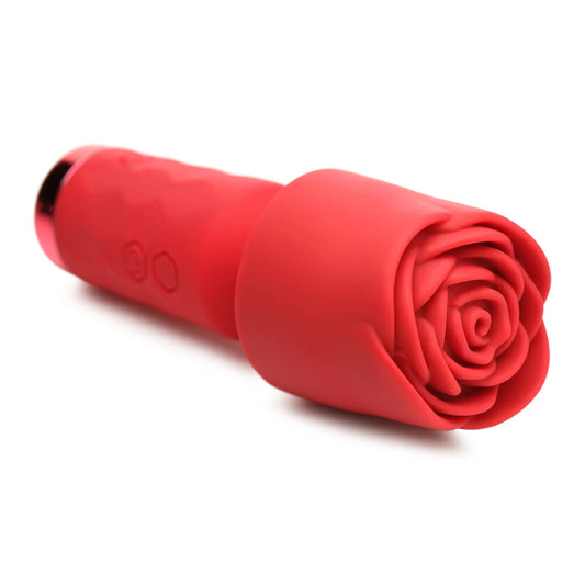 Petite pink rose-shaped vibrator, a mini wand for targeted pleasure and intimate moments.