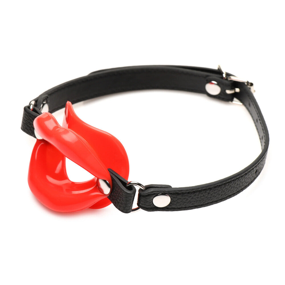 Red, open mouth gag made of silicone, designed for playful fun and games.