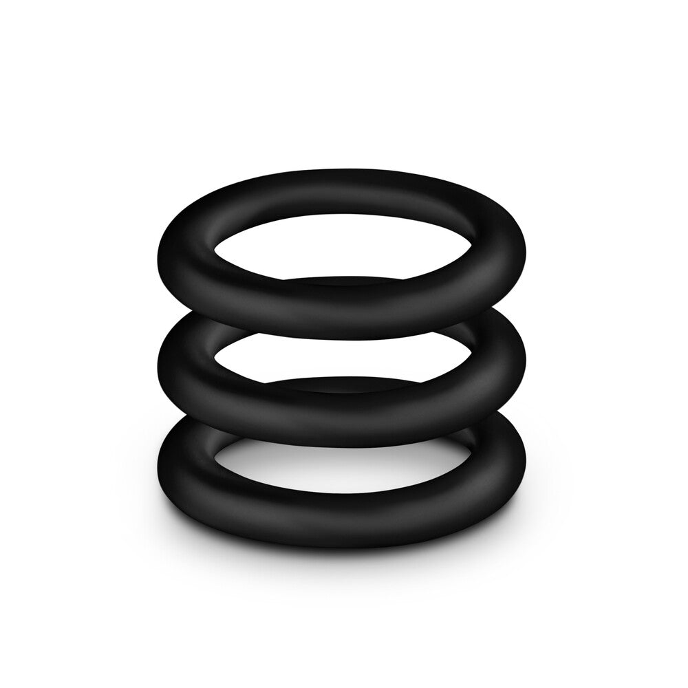 Close-up of a small, black, flexible blush novelties love ring, designed for enhanced performance.