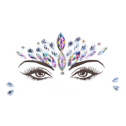 Close-up of a dazzling face gem sticker, opal coloured with a crown design, body jewellery.