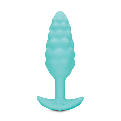 Textured mint-green butt plug from B-Vibe designed for internal stimulation with added vibration.