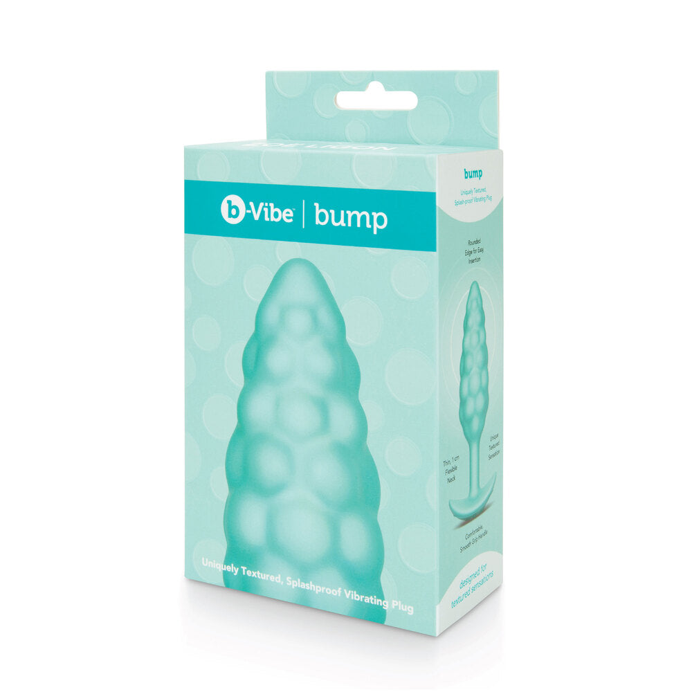 Textured mint green vibrating butt plug from B-Vibe, a sensual adult pleasure toy.