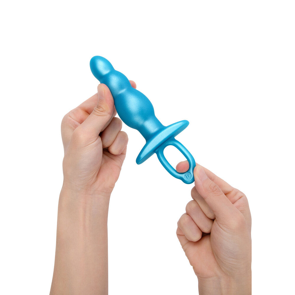 Textured prostate massager plug with a curved design, perfect for internal stimulation and pleasure.