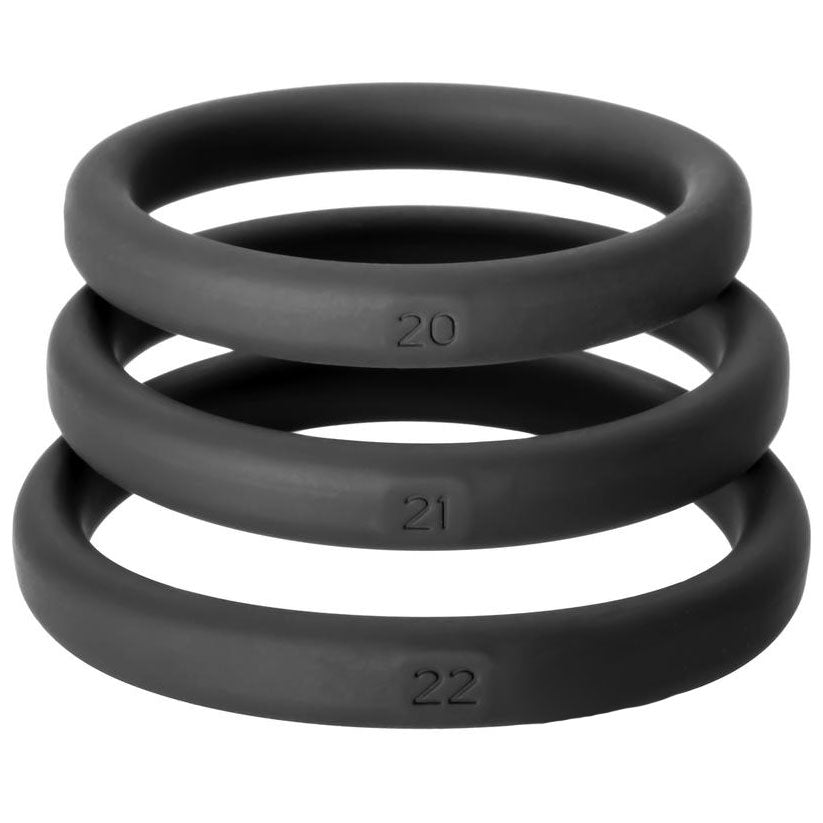 A selection of three perfect fit xactfit cockrings in sizes 20, 21, and 22.
