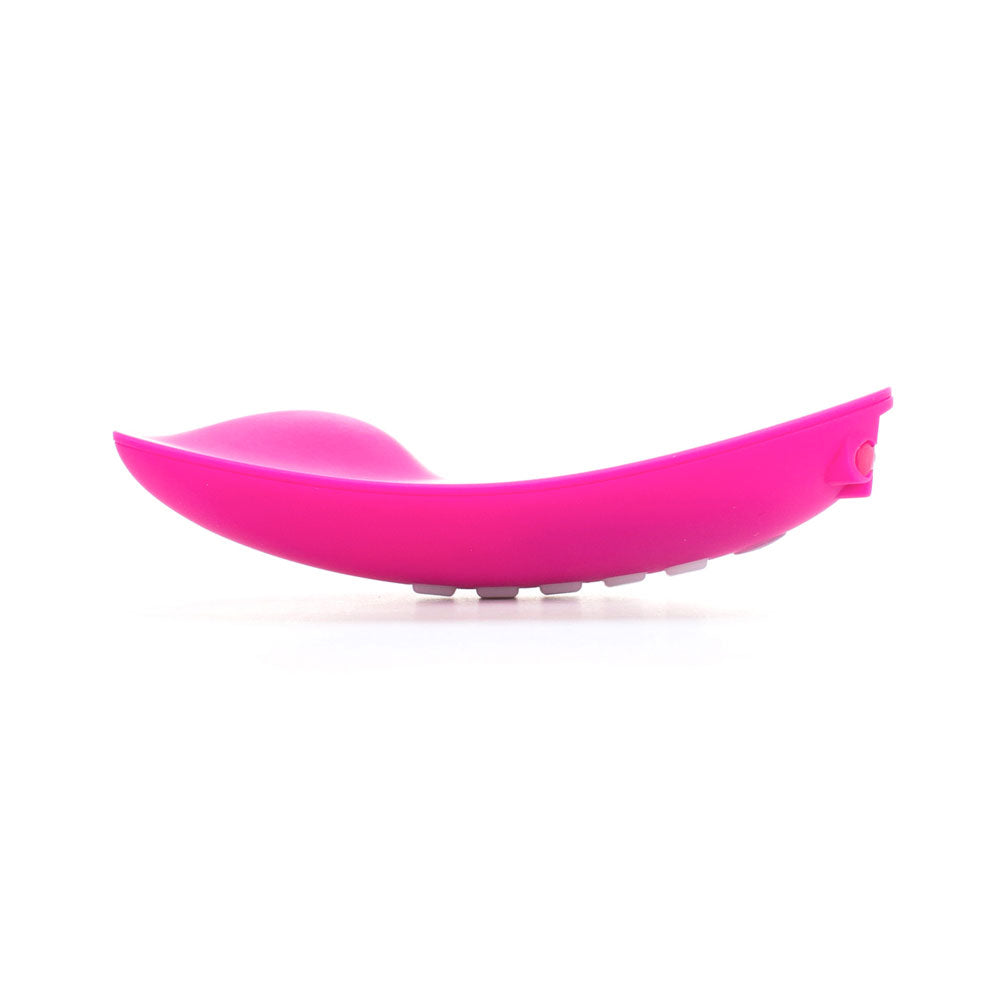 A light-up vibrator by OhMiBod with a remote control, showing its colourful display.