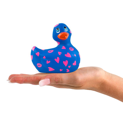 Vibrating rubber duck in pink and white, part of the 'i rub my duckie' collection.