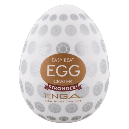 Tenga crater egg masturbator, textured white and orange, for solo adult pleasure.