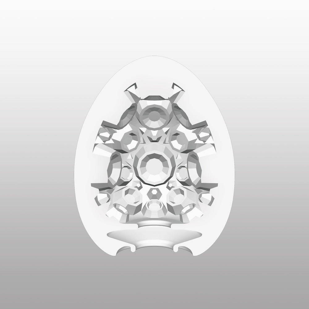 Tenga crater egg masturbator with a textured grey interior, designed for male pleasure.