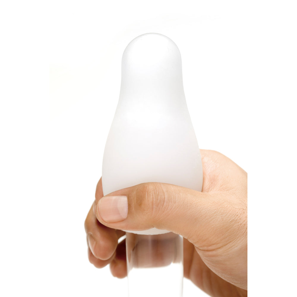 Textured tenga egg masturbator with a crater design, providing a unique stimulation experience.