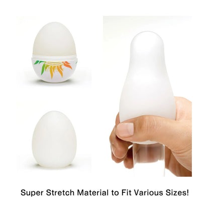 Close-up of a Tenga Egg masturbator, shiny with rainbow coloured accents, for intimate fun.