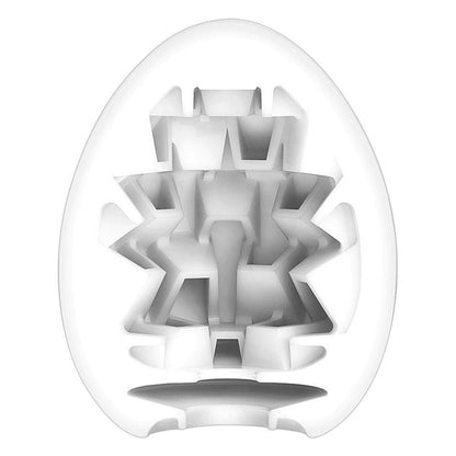 Tenga boxy egg masturbator with a textured surface, a discreet and personal pleasure object.