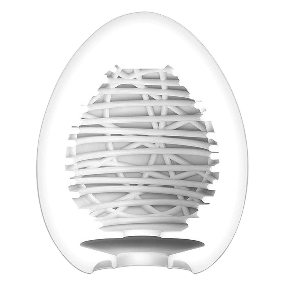 Tenga silky 2 egg masturbator, textured surface, off-white, intimate pleasure product.