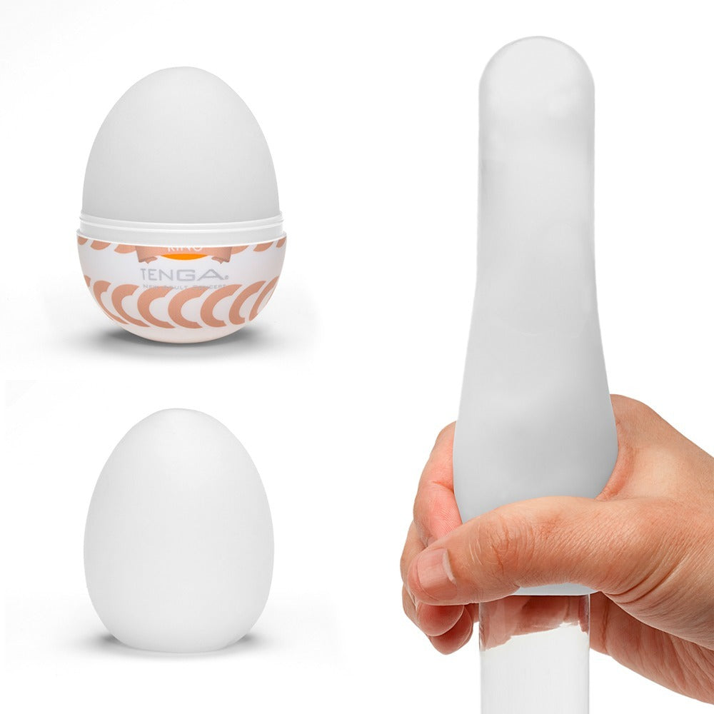 Tenga egg masturbator in a patterned white plastic shell, textured for solo adult fun.