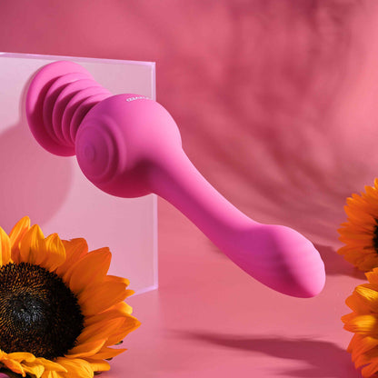 Evolved G-spot vibrator in a dusky rose shade, smooth finish and ergonomic design.