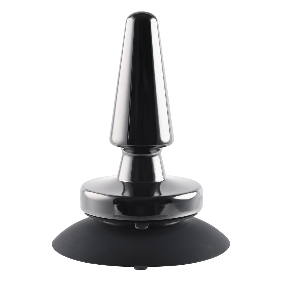 A shiny silver vibrating metal buttplug from evolved sex toys for beginners, closeup.