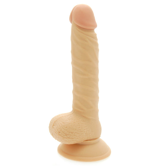 Realistic eight-inch dildo with a detailed scrotum, made by nmc ltd, skin tone.