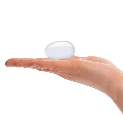 Two clear glass yoni eggs, a set for pelvic floor exercises and pleasure.