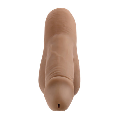 Love Kinx gender x stand to pee tpe dildo in a medium flesh tone.