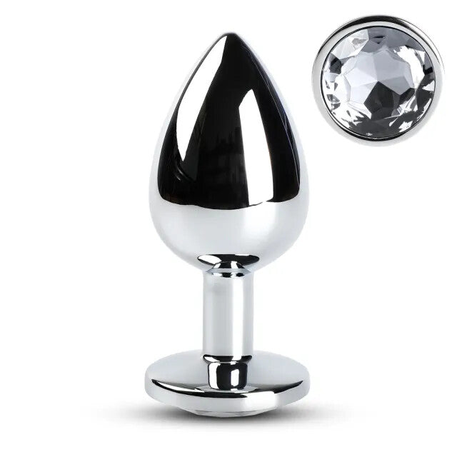 Large silver metal butt plug with a clear crystal at the base, shiny finish.