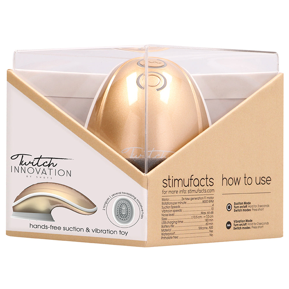 Gold-coloured, hands-free suction and vibration sex toy for clitoral stimulation by Shots Toys.