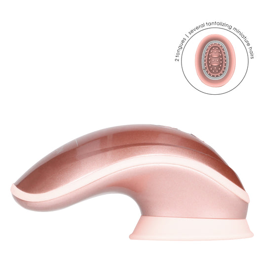 Rose gold hands-free vibrator from Shots Toys, designed for clitoral stimulation with suction and vibration.