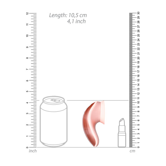 Rose gold clitoral vibrator with suction cup base for hands-free pleasure, a sleek and modern design.