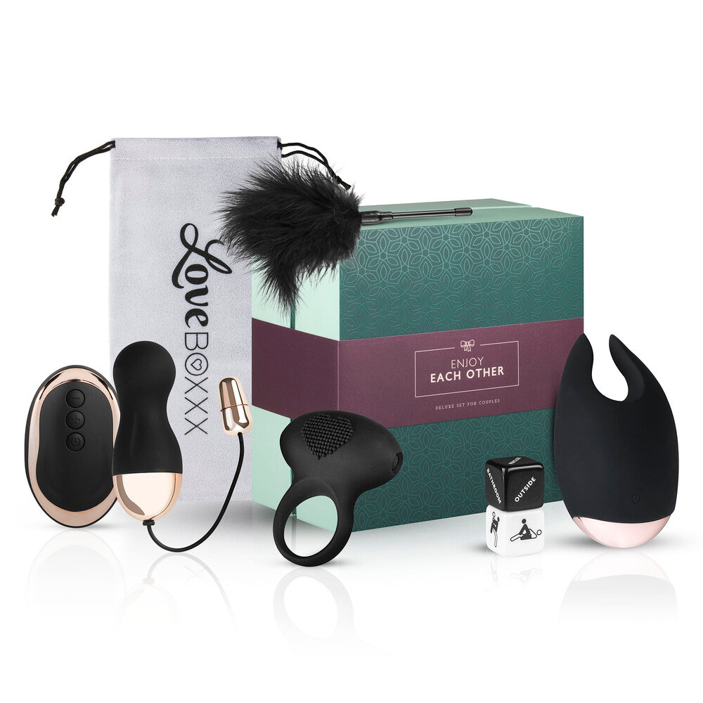 Loveboxxx romantic gift set for couples, featuring a red box with various lovemaking accessories.