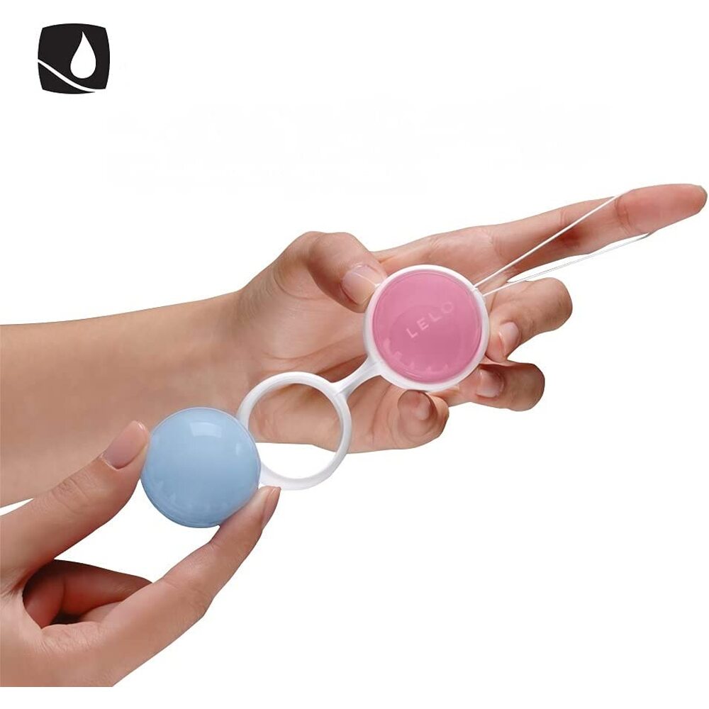 A set of smooth, pink and blue lelo luna orgasm balls for pelvic floor exercise.