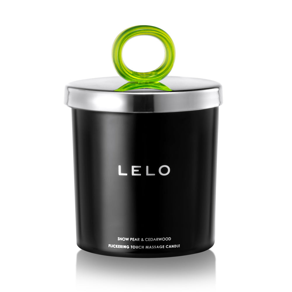 Lelo massage candle in a white ceramic container, evoking snow pear and cedarwood scents.