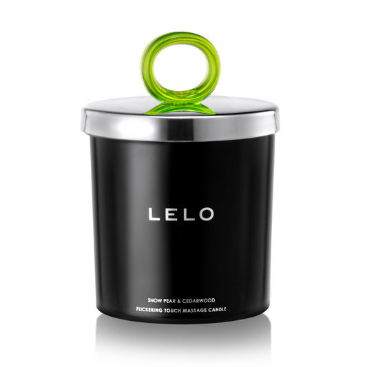 Lelo massage candle in a white ceramic container, evoking snow pear and cedarwood scents.