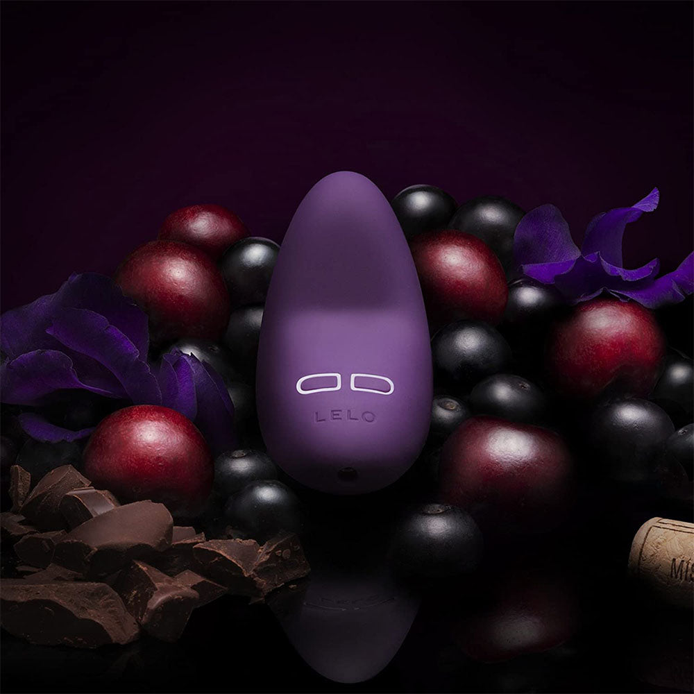 Close-up of the Lelo Lily 2 clitoral vibrator in a rose and wisteria pink.