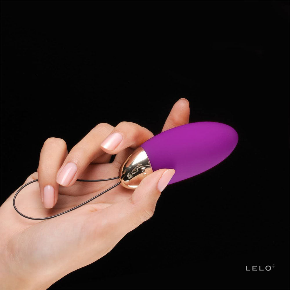 Deep rose Lelo Lyla 2 bullet vibrator, smooth finish, pleasure object for intimate use.