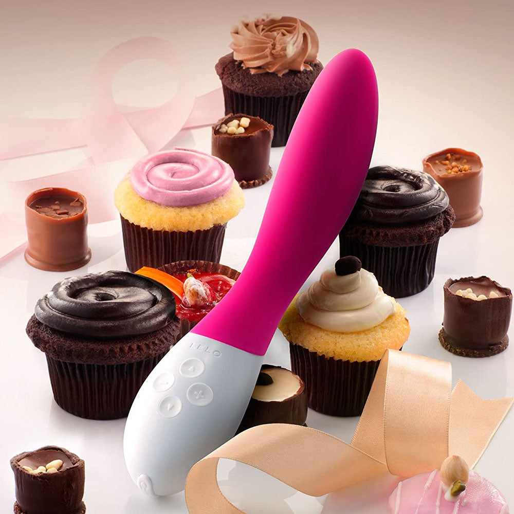 Close-up of a smooth, curved, purple g-spot massager by lelo for intimate pleasure.