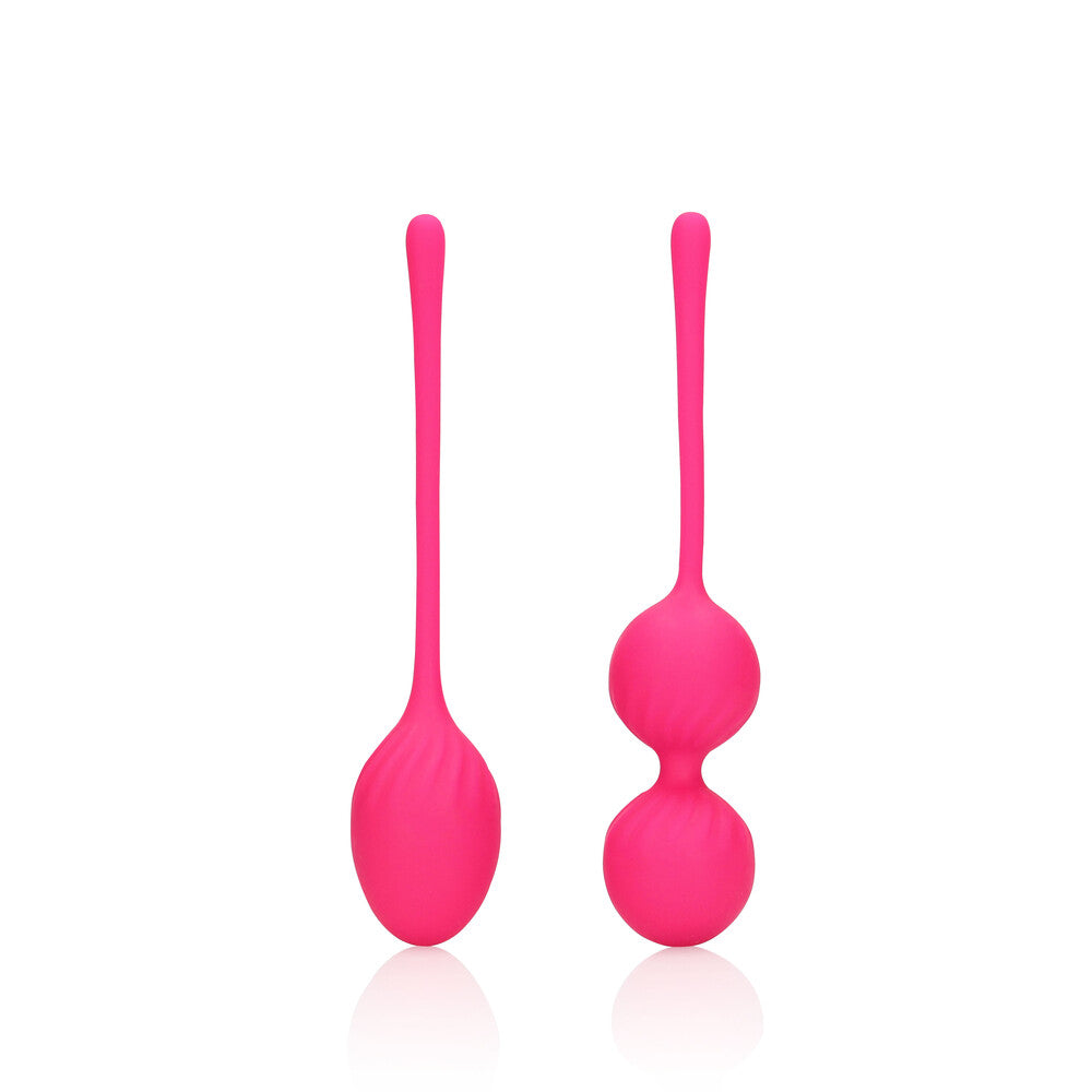 Set of pink kegel exercise balls from shots toys for pelvic floor strengthening.