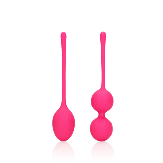 Set of pink kegel exercise balls from shots toys for pelvic floor strengthening.