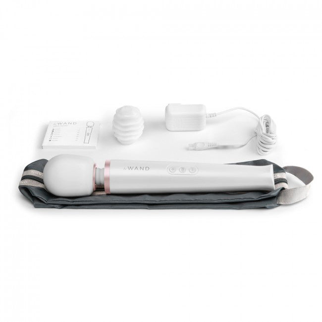The le wand rechargeable massager in white, a sleek personal massager for relaxation.