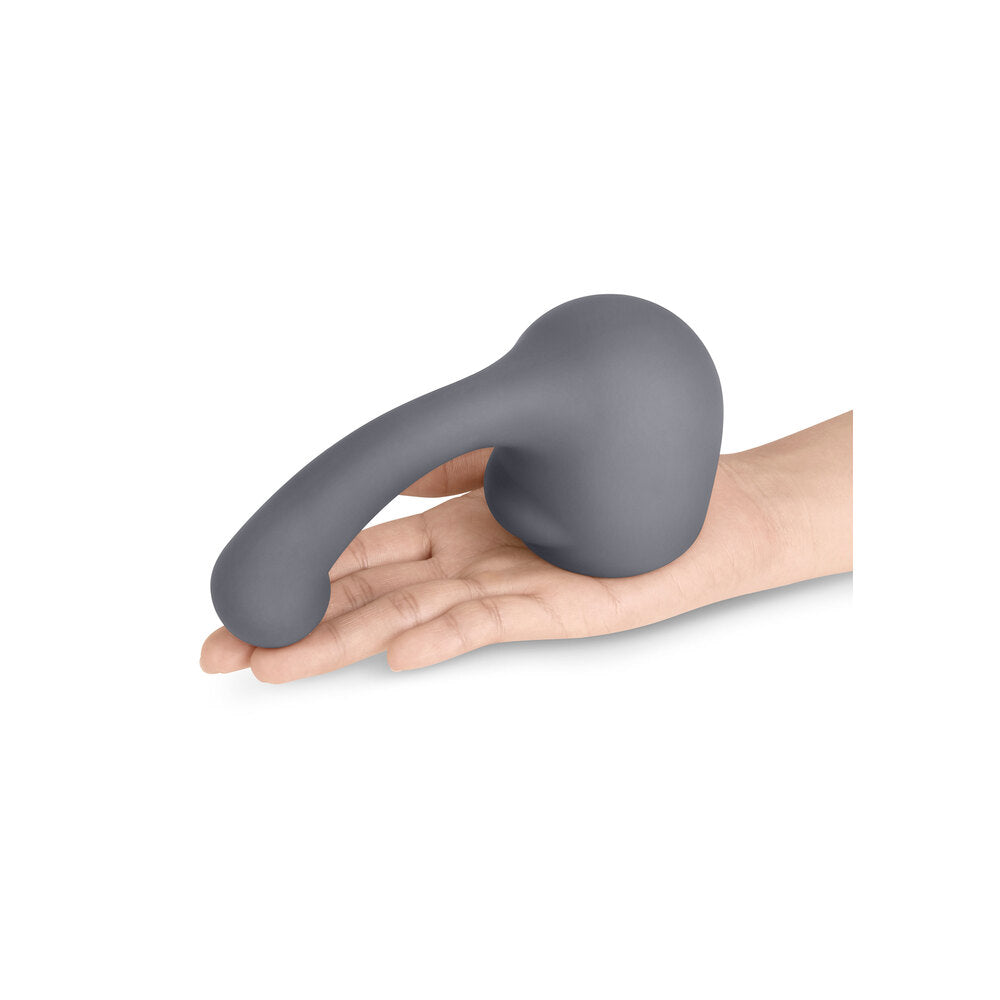 The le wand curve attachment, a smooth, weighted silicone wand in a muted tone.