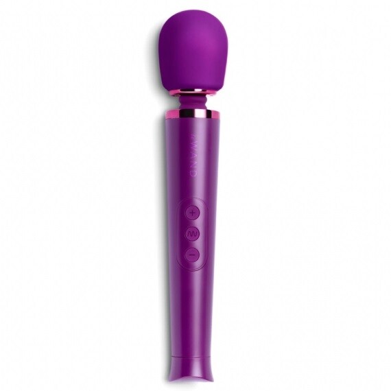 Dark cherry Le Wand Petite rechargeable massager, a small vibrating wand for personal use.