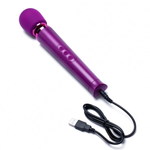 Dark cherry Le Wand Petite rechargeable massager, a sleek, compact personal pleasure device.