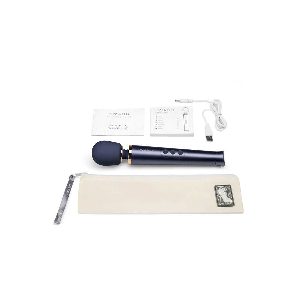 Petite Le Wand rechargeable wand massager in navy blue, a personal handheld vibrator.
