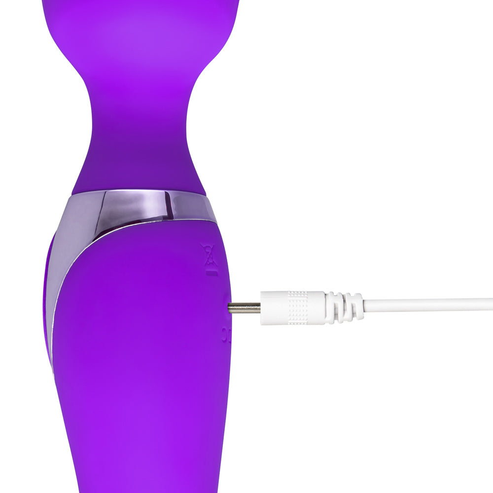 Double-ended wand massager in silver, designed for versatile use with varying speed settings.