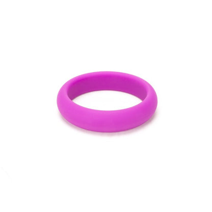 Close-up of a smooth, 50mm wide, grey silicone ring from me you us; a love ring.