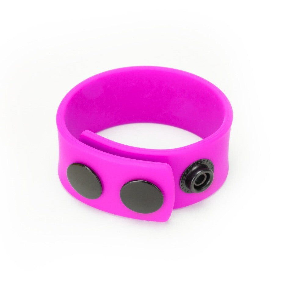 Purple silicone cock strap or love ring for enhanced pleasure and support.