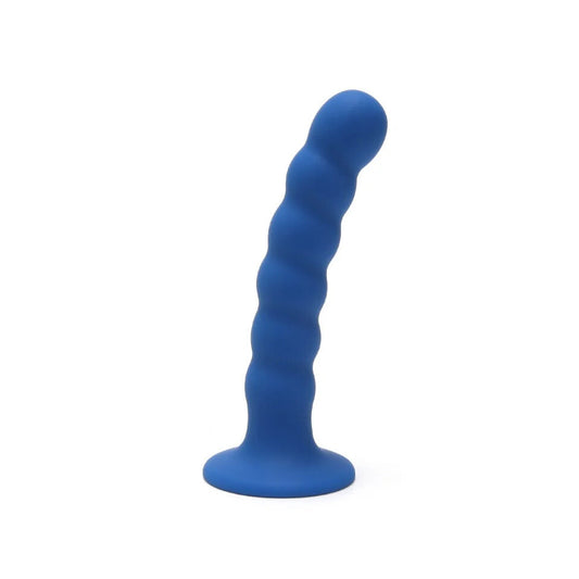 Ripple-textured 5.5 inch g spot dildo in a soft, skin-safe material; a strap-on toy.