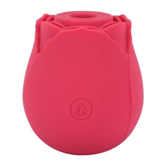 Close-up of a rosebud-shaped clitoral vibrator in a soft, skin-like material for pleasure.