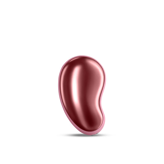 Close-up of a rose-gold coloured clitoral vibrator from NS Novelties with smooth finish.