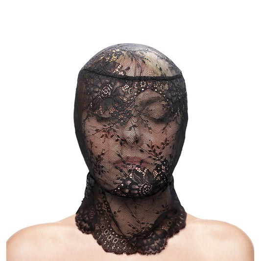 Close-up of a black lace hood, a striking fashion accessory with fetish undertones.