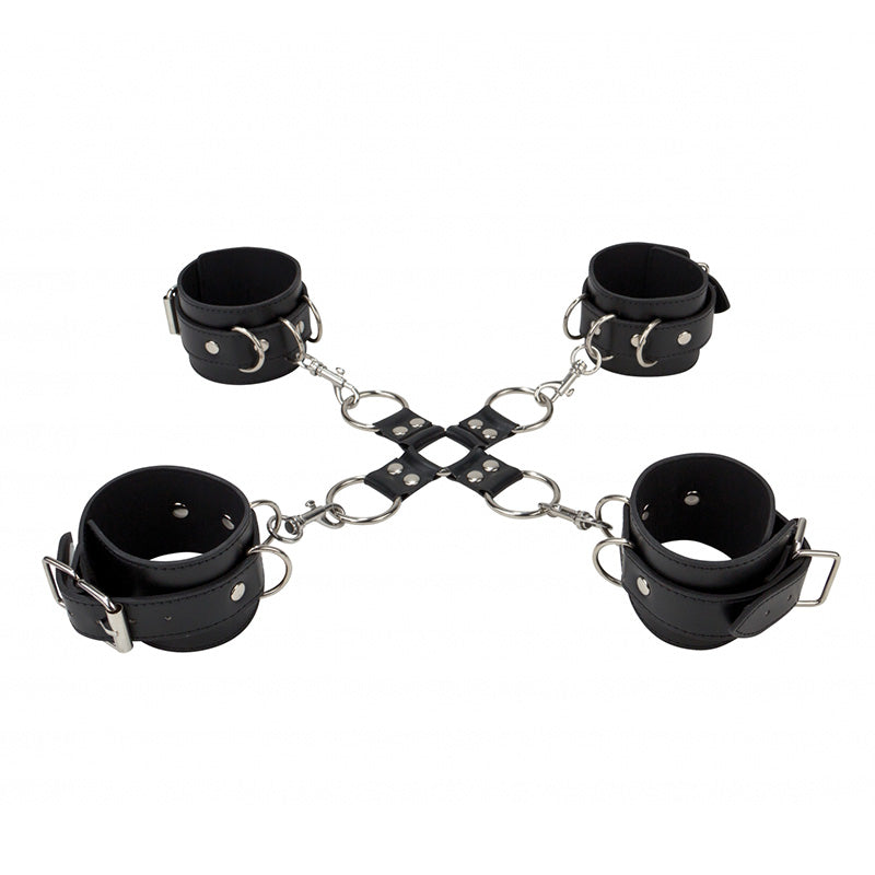 Shots Toys black leather hand and leg cuffs, a restraining set for playful bondage.