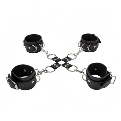 Shots Toys black leather hand and leg cuffs, a restraining set for playful bondage.